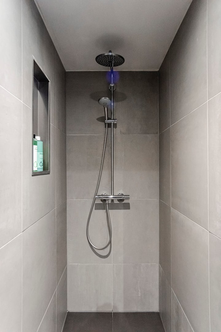 Rain shower with modern fixtures